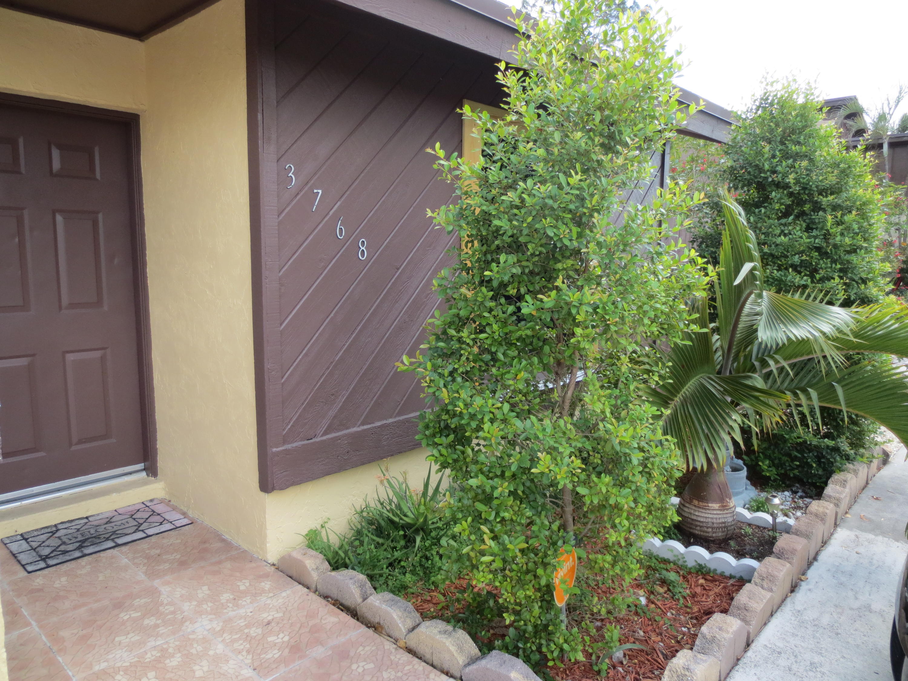 3768 Mil-Stream Court Greenacres, FL 33463 - Photo 33 of 36 a view of a backyard