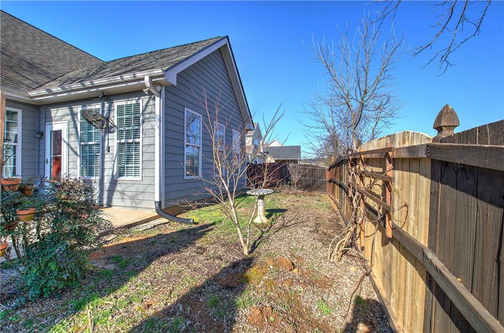 29 Autumn Street Northwest Cartersville, GA 30121 - Photo 30 of 31 a view of a house with a yard