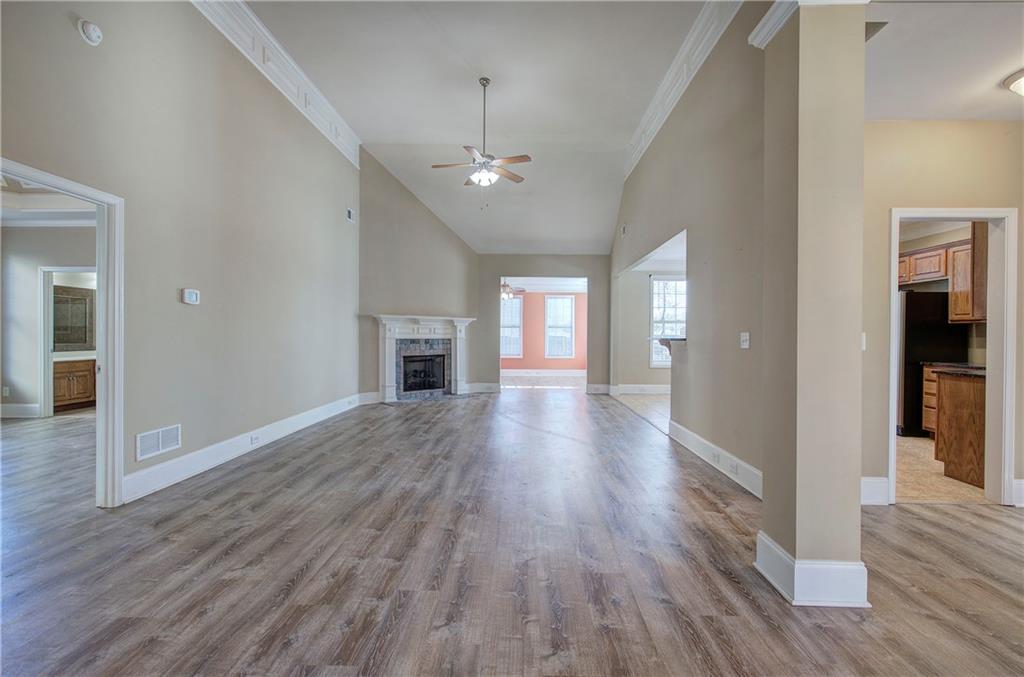 29 Autumn Street Northwest Cartersville, GA 30121 - Photo 5 of 31 wooden floor in an empty room with a window