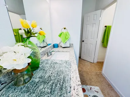 a view of living room with wooden floor