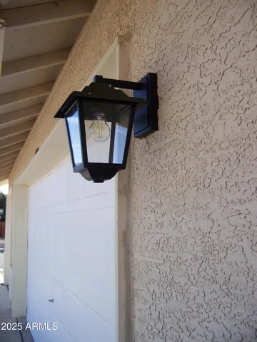 a front view of a house with stairs