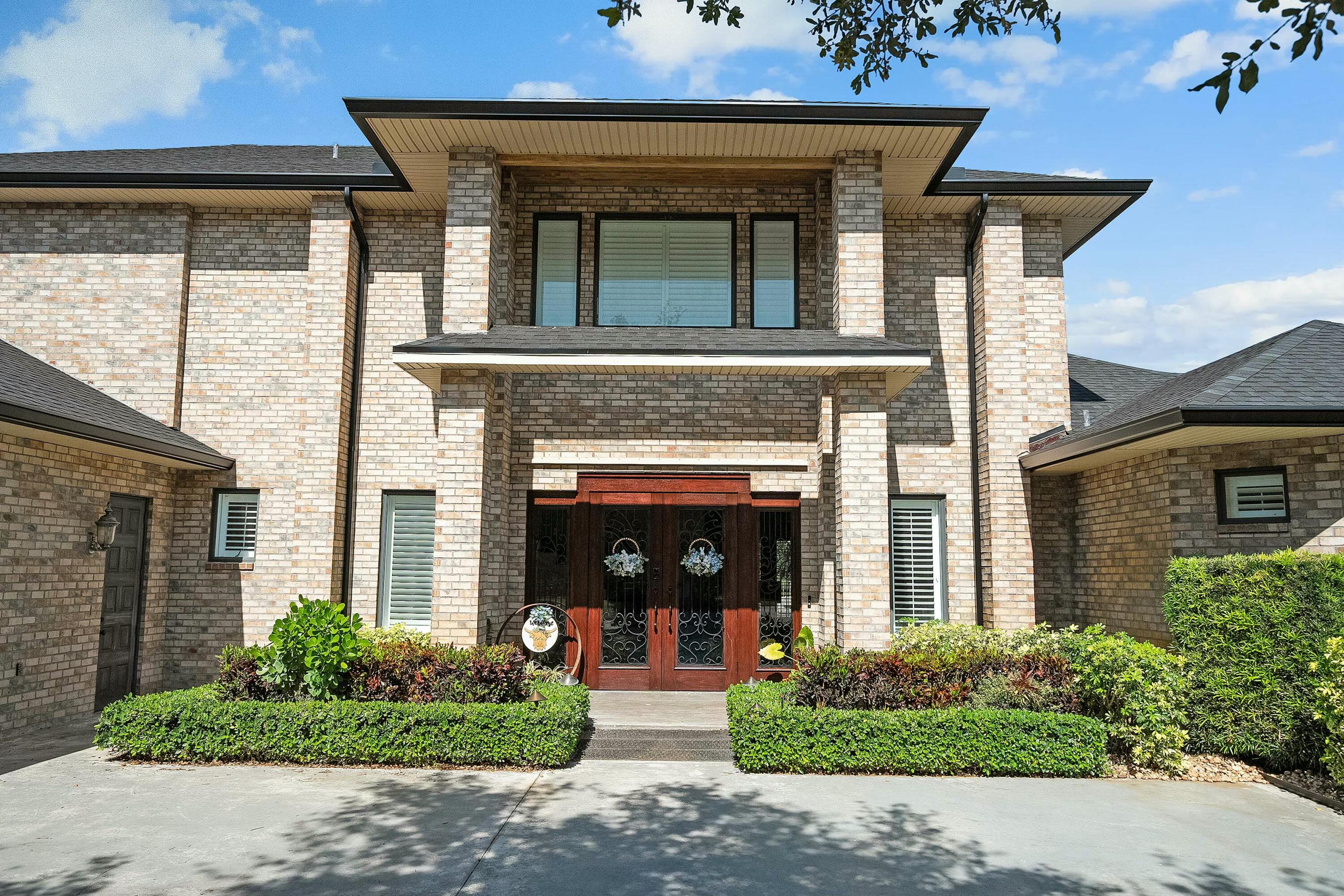 6655 Southwest Gaines Avenue Stuart, FL 34997 - Photo 13 of 46 Front Exterior