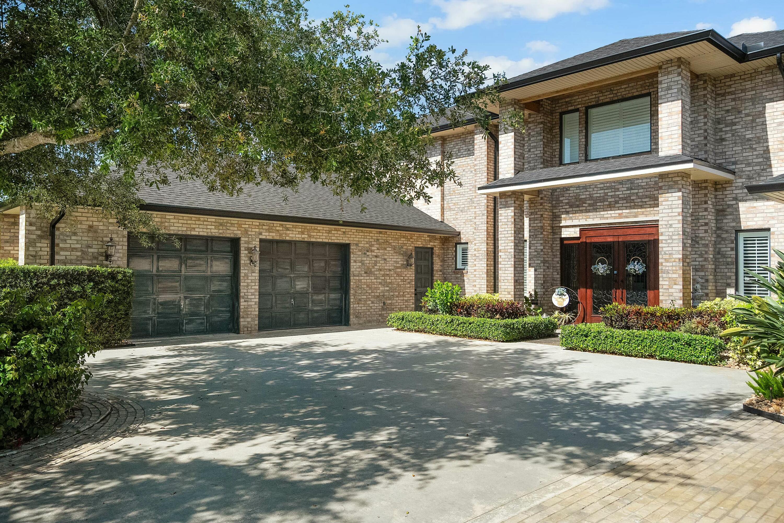 6655 Southwest Gaines Avenue Stuart, FL 34997 - Photo 45 of 46 Front Exterior