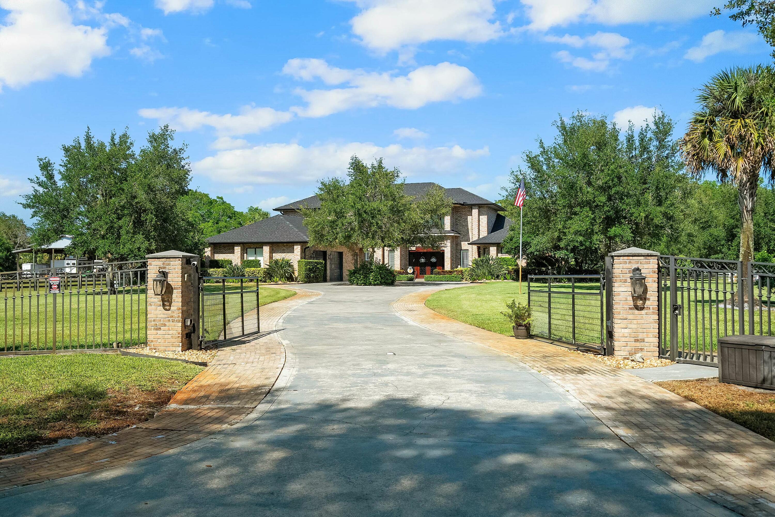 6655 Southwest Gaines Avenue Stuart, FL 34997 - Photo 46 of 46 Front Gate
