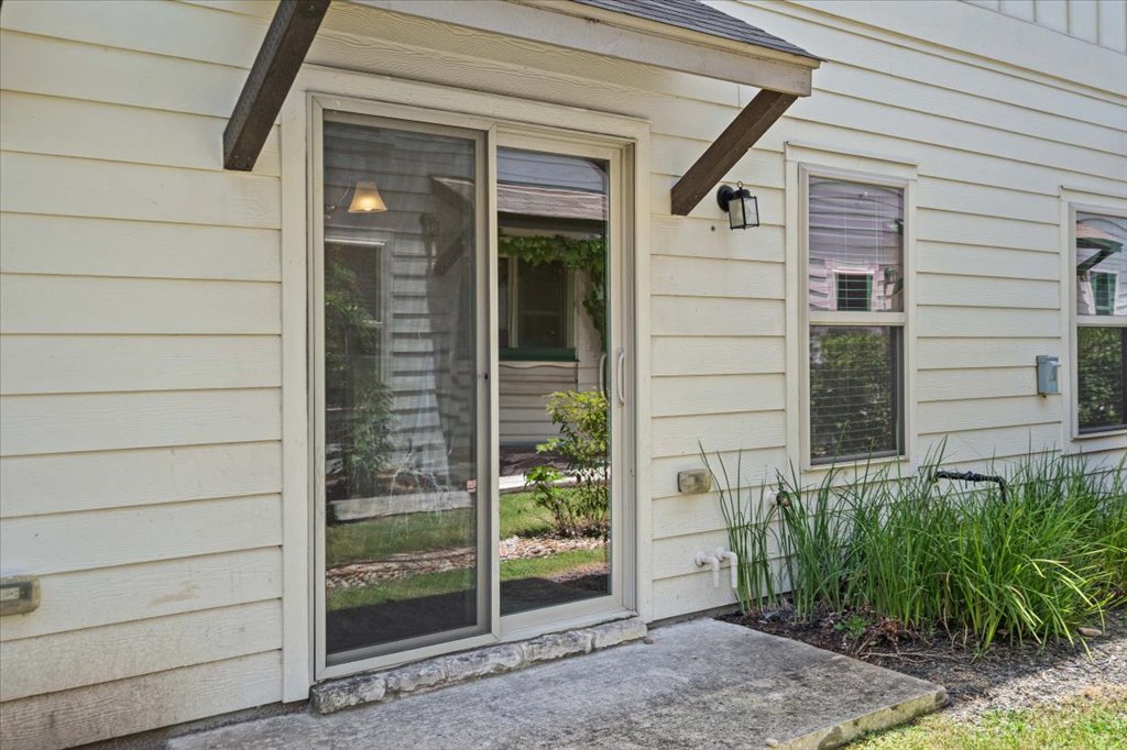 1502 Airedale Road, Unit 2502 Austin, TX 78748 - Photo 16 of 28 A convenient sliding glass door offers seamless access to the outdoors.