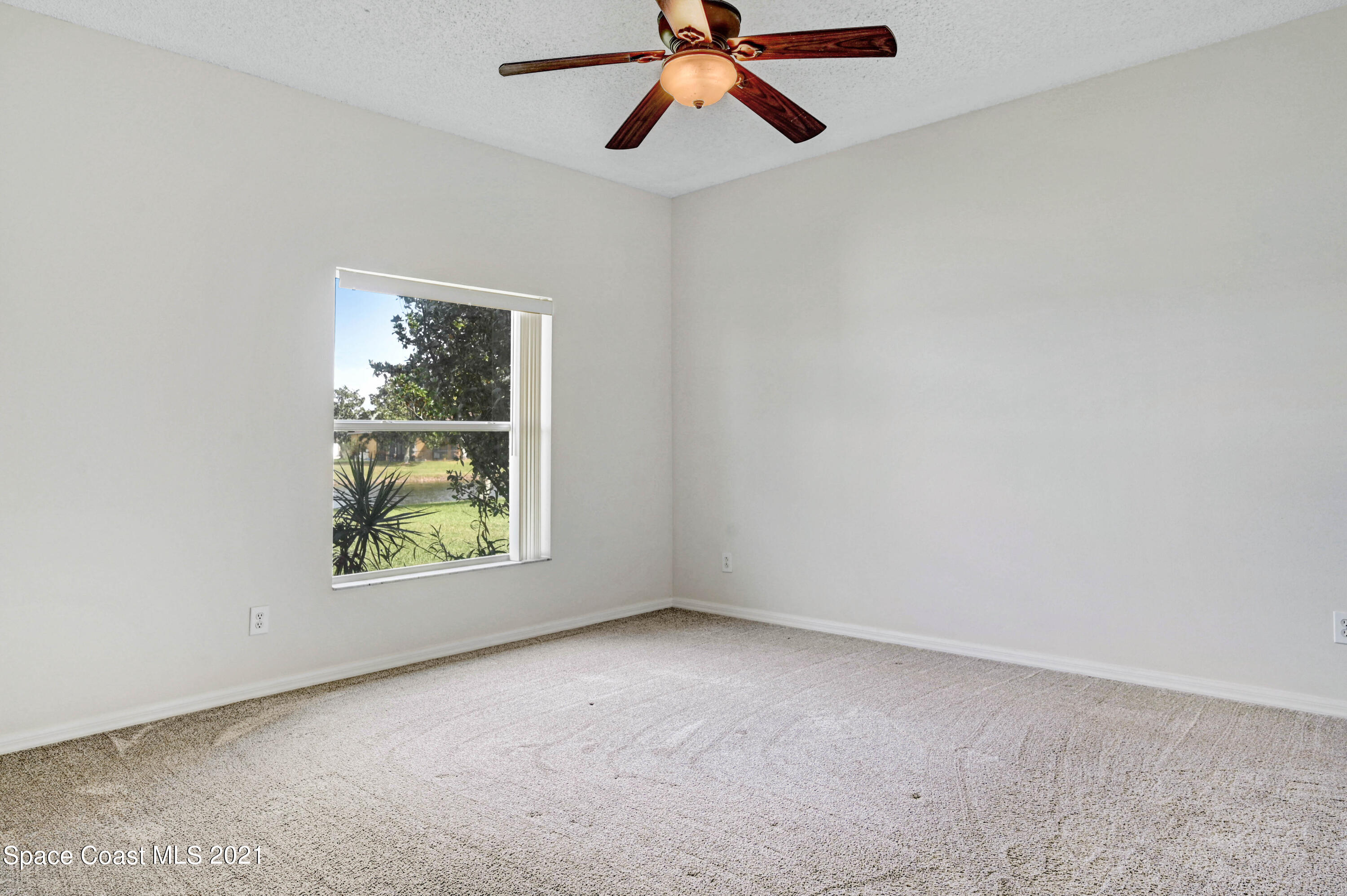 1475 Knoll Ridge Drive Melbourne, FL 32940 - Photo 22 of 39 an empty room with window