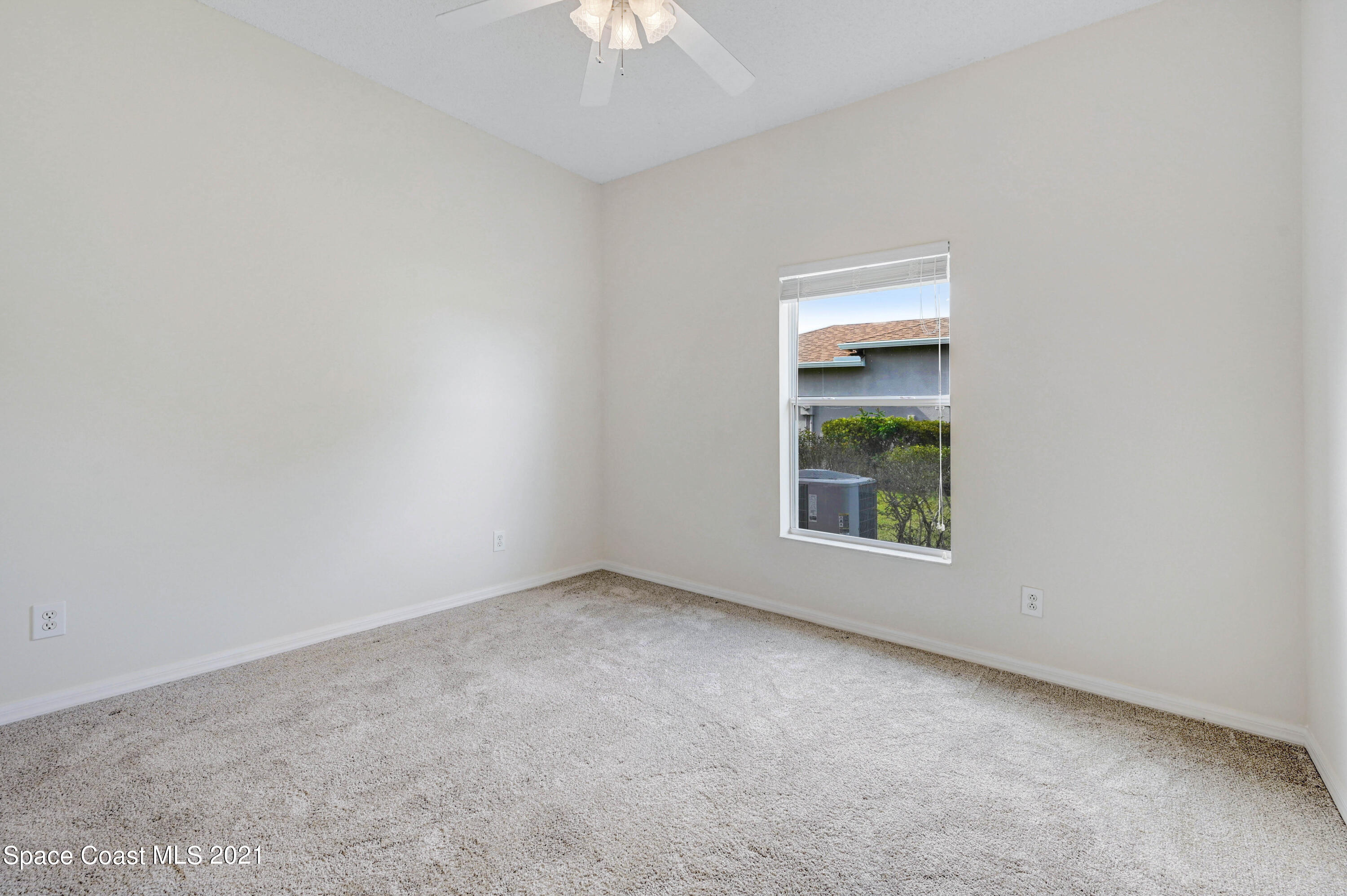 1475 Knoll Ridge Drive Melbourne, FL 32940 - Photo 27 of 39 an empty room with a window