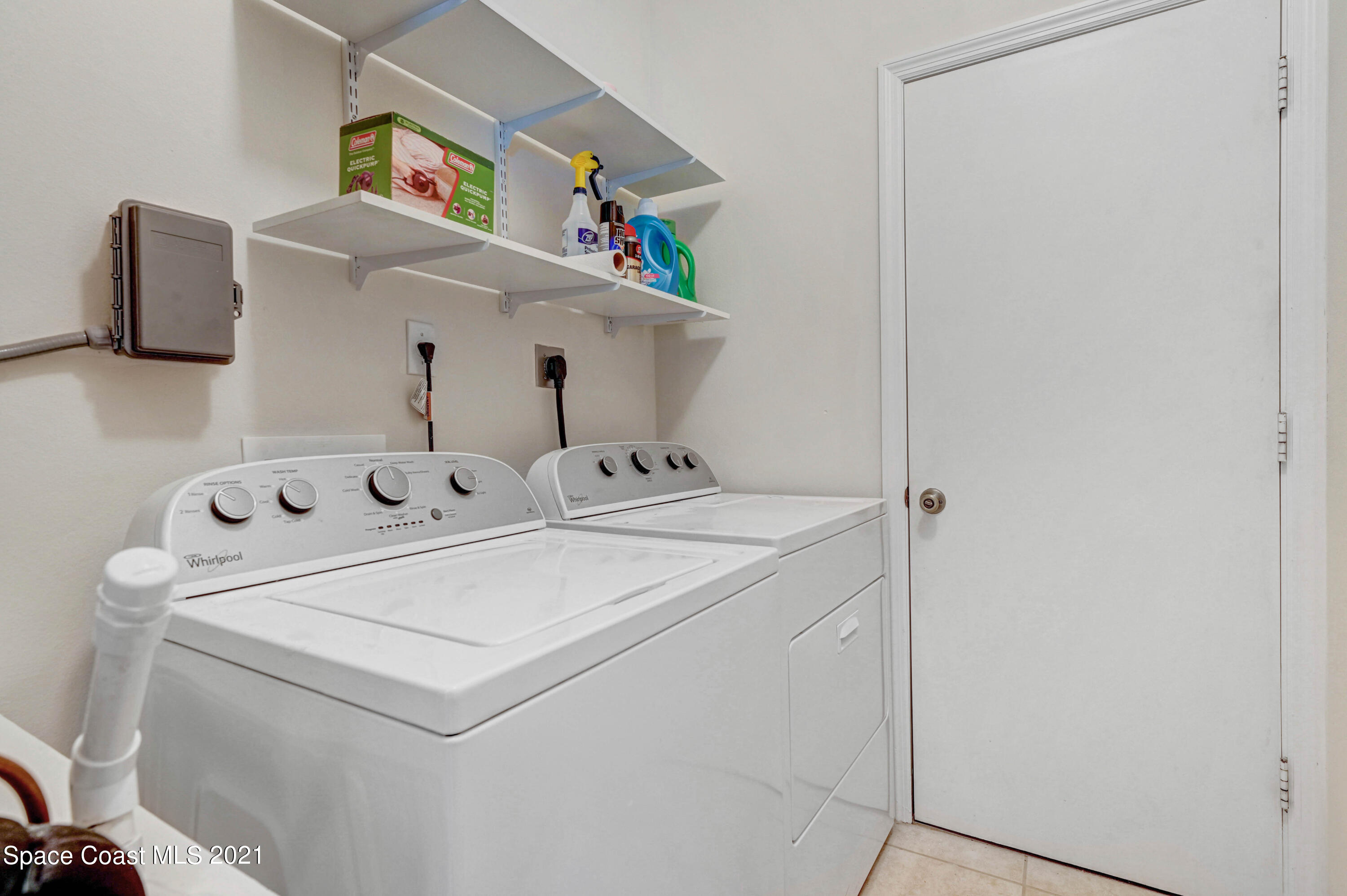 1475 Knoll Ridge Drive Melbourne, FL 32940 - Photo 30 of 39 a utility room with dryer and washer