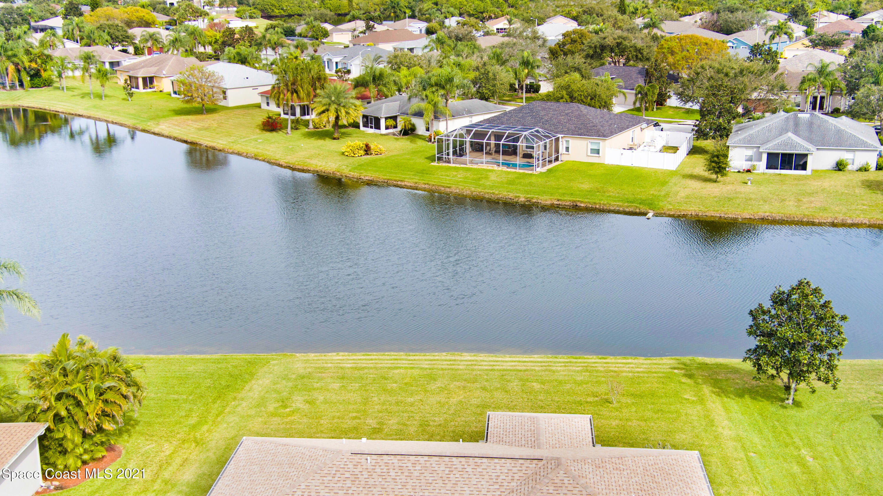 1475 Knoll Ridge Drive Melbourne, FL 32940 - Photo 38 of 39 a view of an swimming pool with a yard