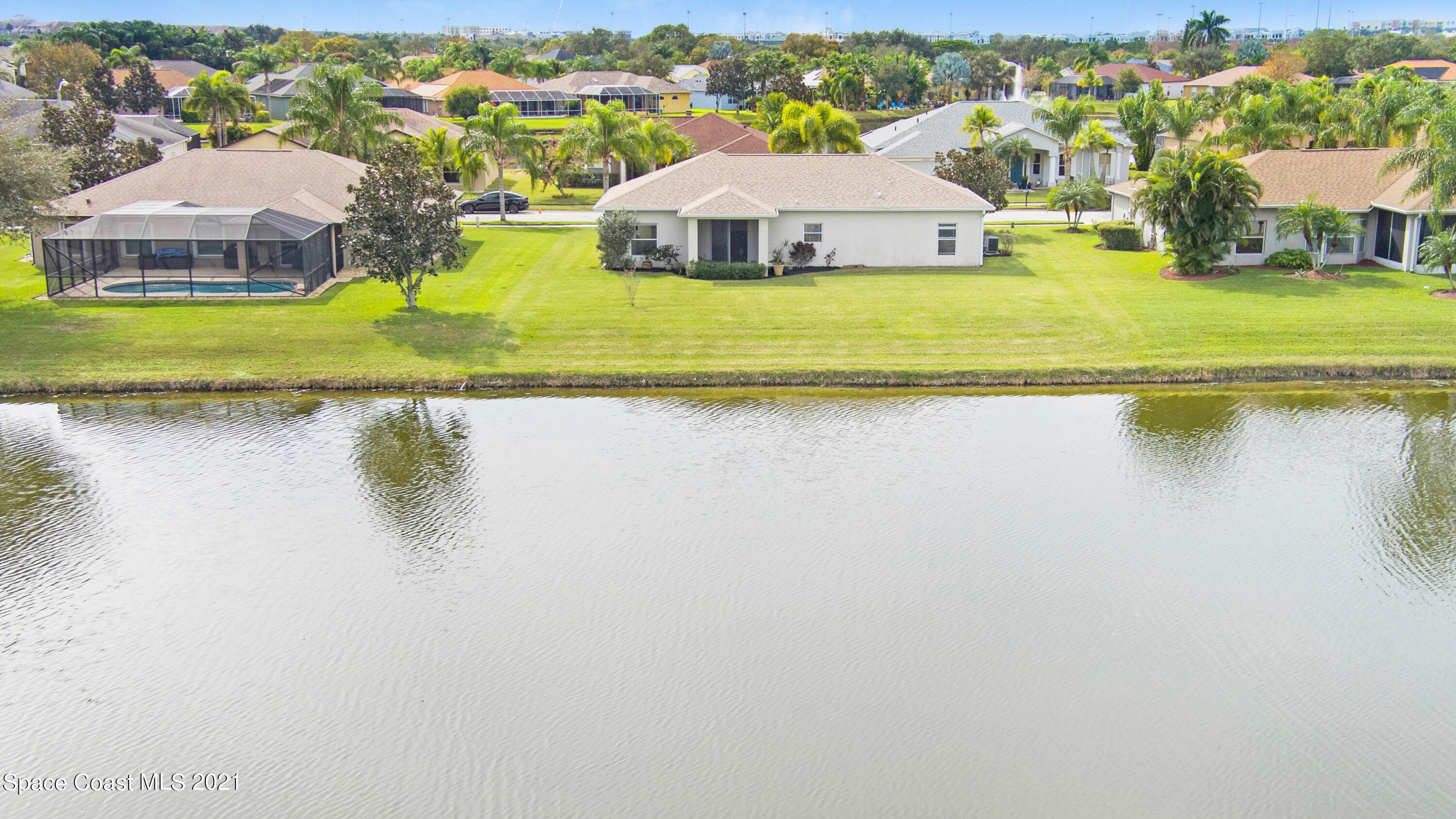 1475 Knoll Ridge Drive Melbourne, FL 32940 - Photo 6 of 39 an aerial view of residential houses with outdoor space and lake view