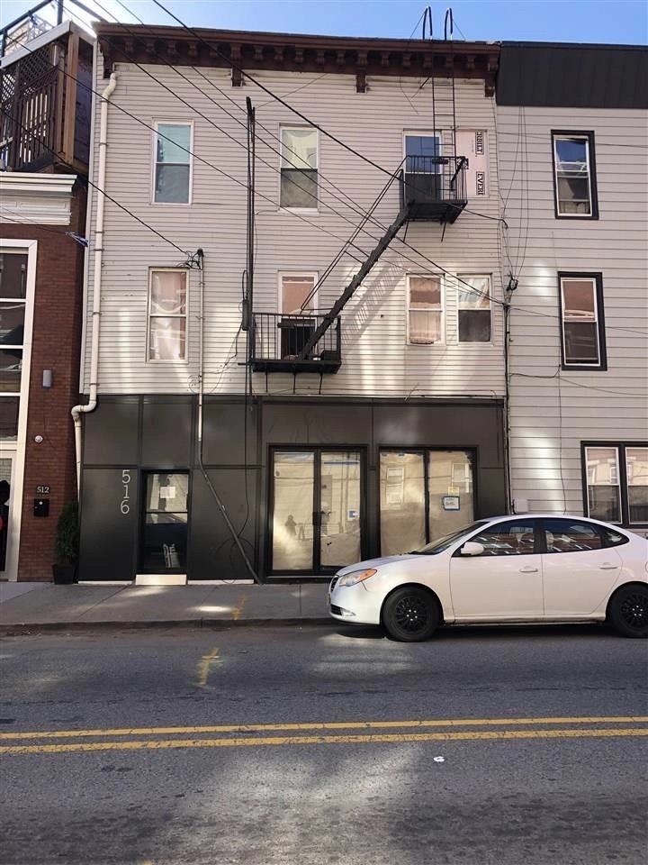 a car parked in front of a building
