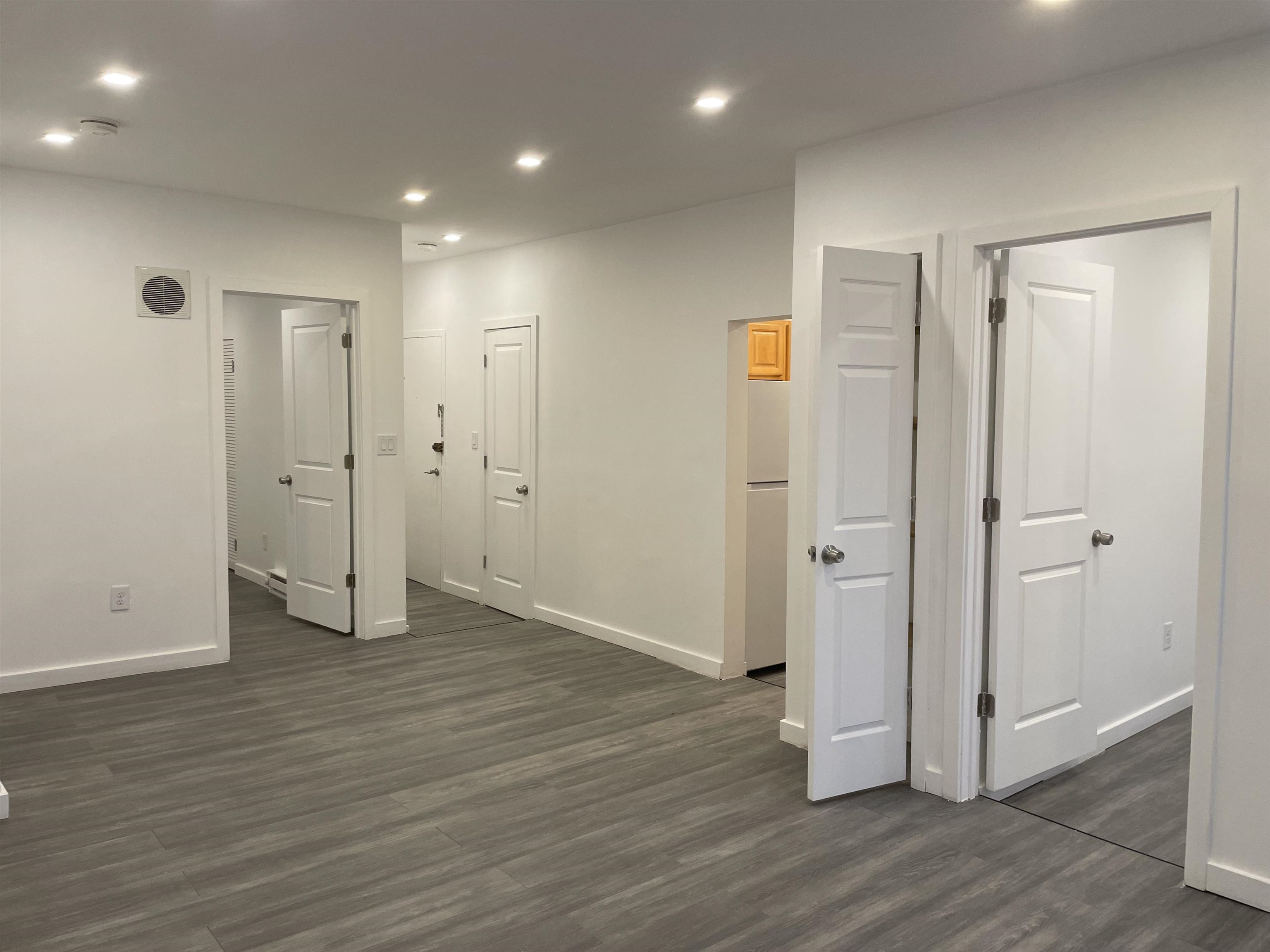 516 Paterson Plank Road, Unit 2R Jersey City, NJ 07307 - Photo 5 of 13 a view of empty room with wooden floor