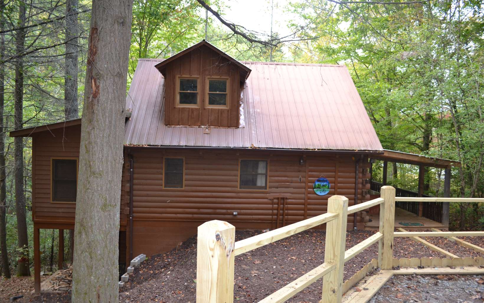 611 Magnolia Drive Blue Ridge, GA 30513 - Photo 1 of 1 a front view of a house with parking
