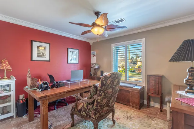 a view of a dining room with furniture