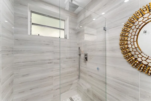 a bathroom with a mirror