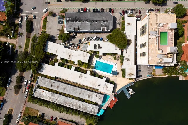 a view of roof deck with patio and outdoor seating