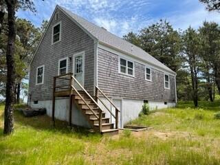 236 Chappaquiddick Road Edgartown, MA 02539 - Photo 3 of 16 a view of a house with a yard