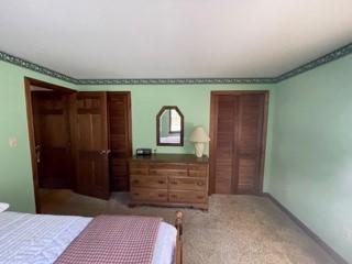236 Chappaquiddick Road Edgartown, MA 02539 - Photo 9 of 16 a bedroom with a bed and a dresser