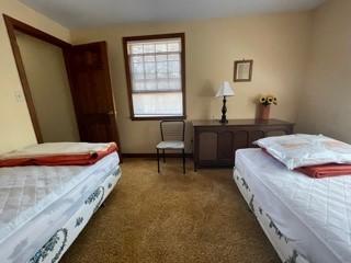 236 Chappaquiddick Road Edgartown, MA 02539 - Photo 10 of 16 a bedroom with bed and a window