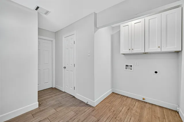 a view of room with hardwood floor