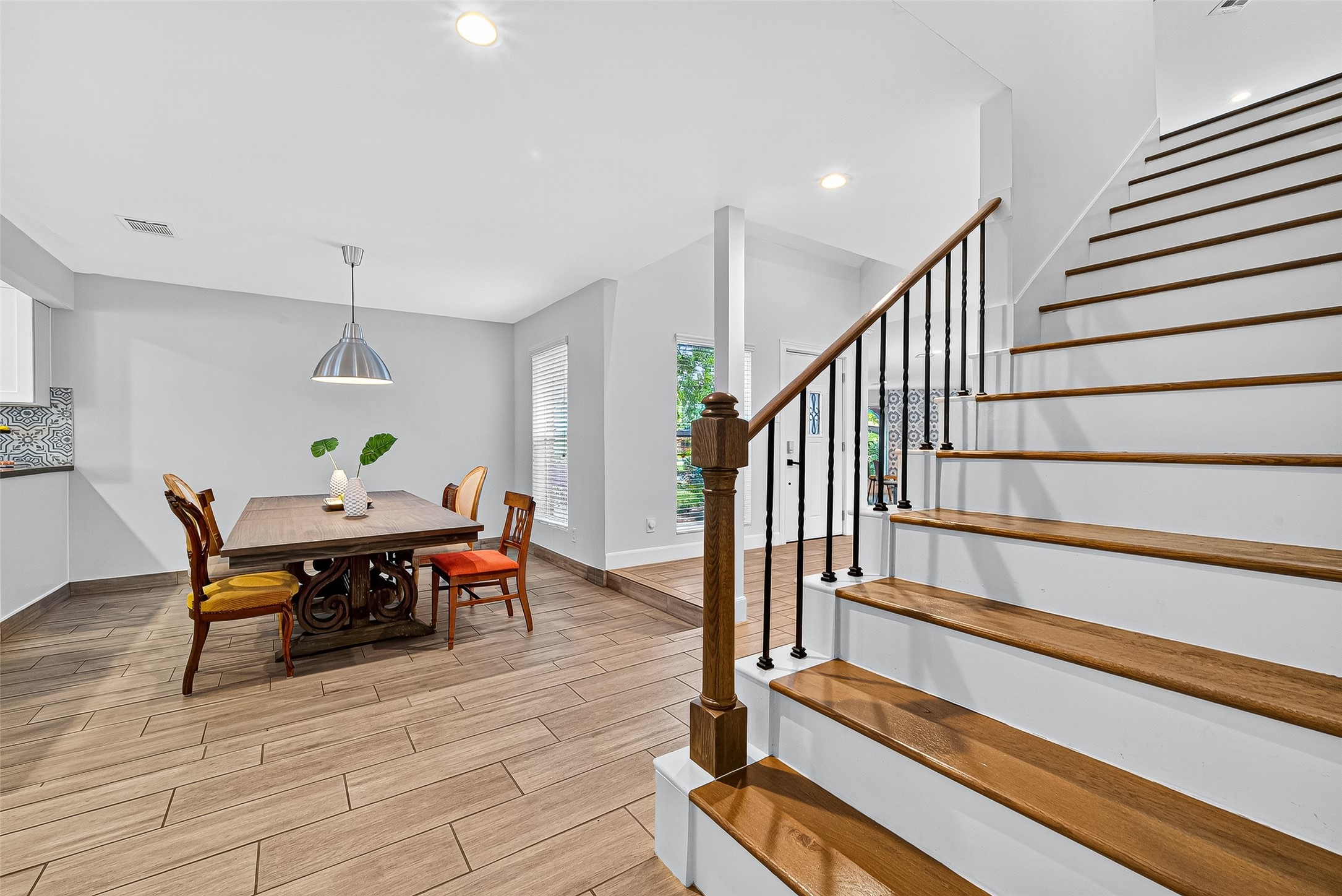 818 Silvergate Drive Houston, TX 77079 - Photo 27 of 40 a view of dining room and wooden floor