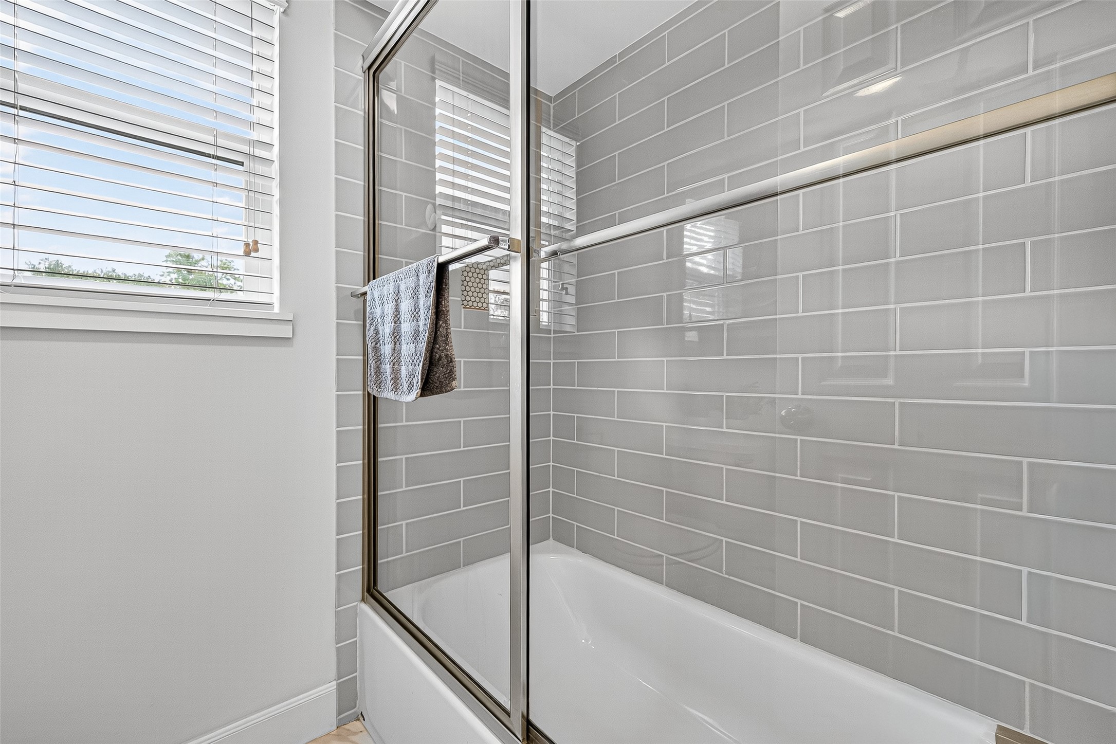 818 Silvergate Drive Houston, TX 77079 - Photo 34 of 40 a bathroom with a shower