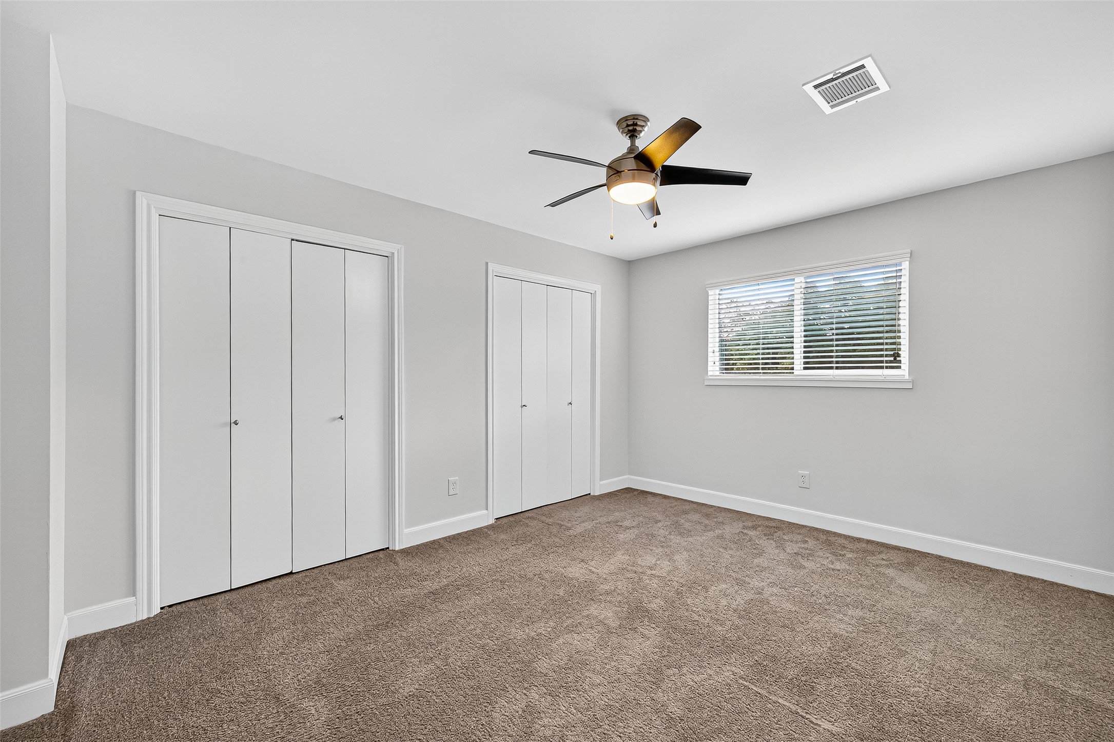 818 Silvergate Drive Houston, TX 77079 - Photo 35 of 40 a view of an empty room with a window