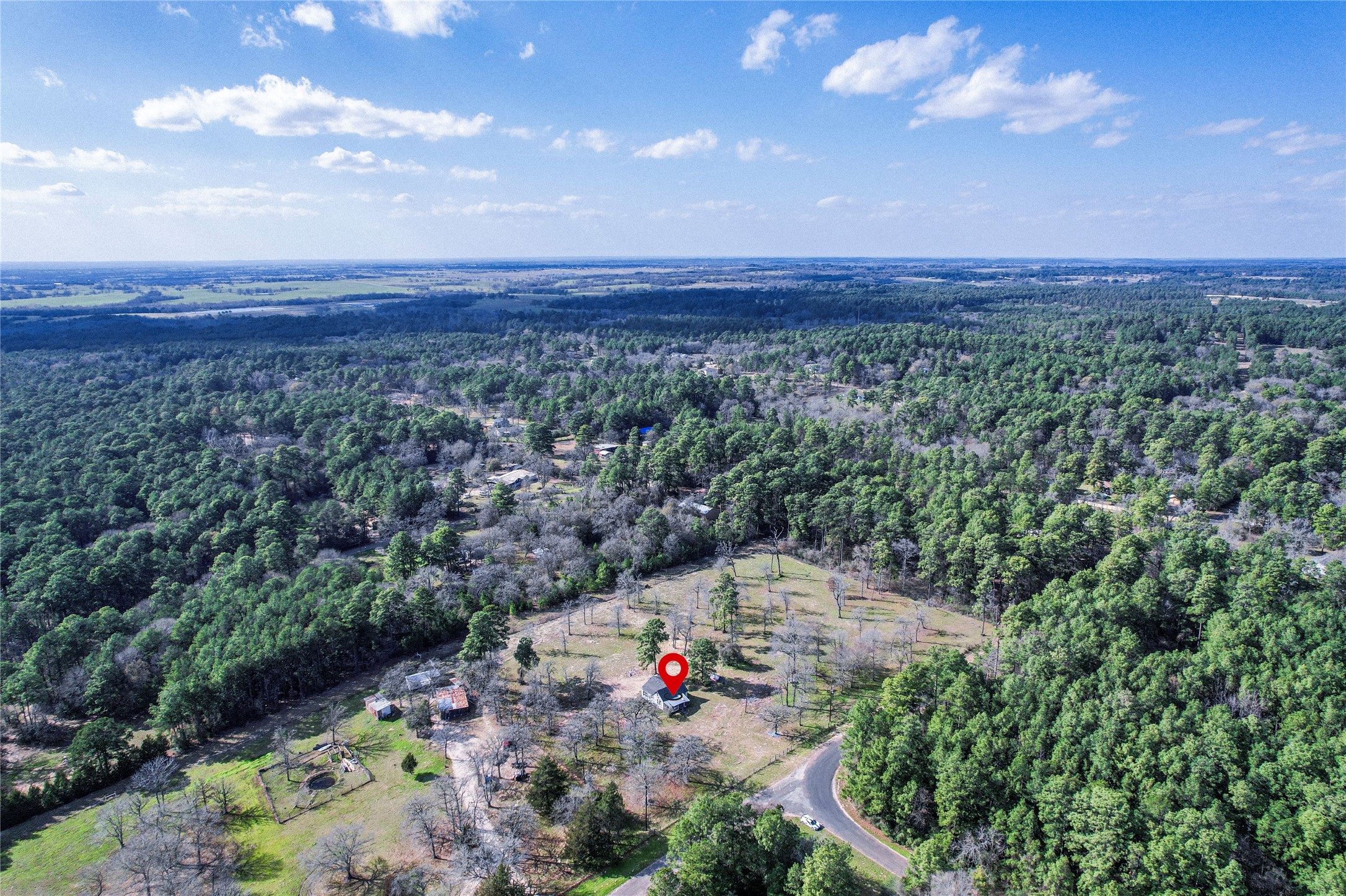 6445 North Hill Road Navasota, TX 77868 - Photo 2 of 11 an aerial view of a houses