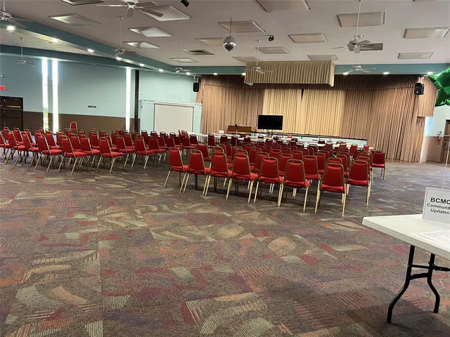 a group of people sitting in a room