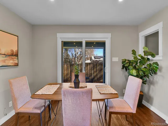 a view of a room with furniture window and wooden floor