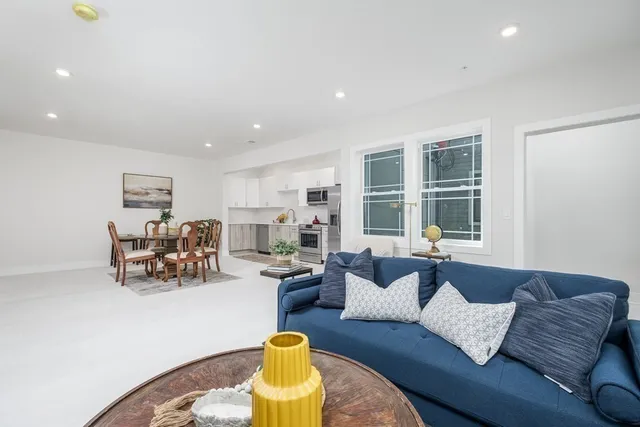a living room with furniture and a couch