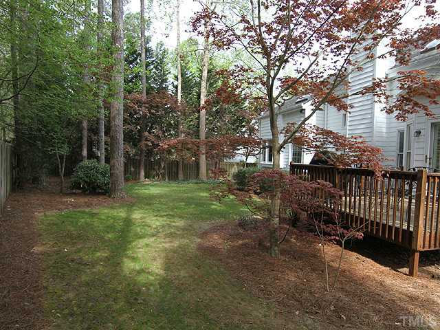 5101 Talton Circle Raleigh, NC 27612 - Photo 23 of 25 Large, level wooded back yard and deck for ultimate relaxation. Back Yard