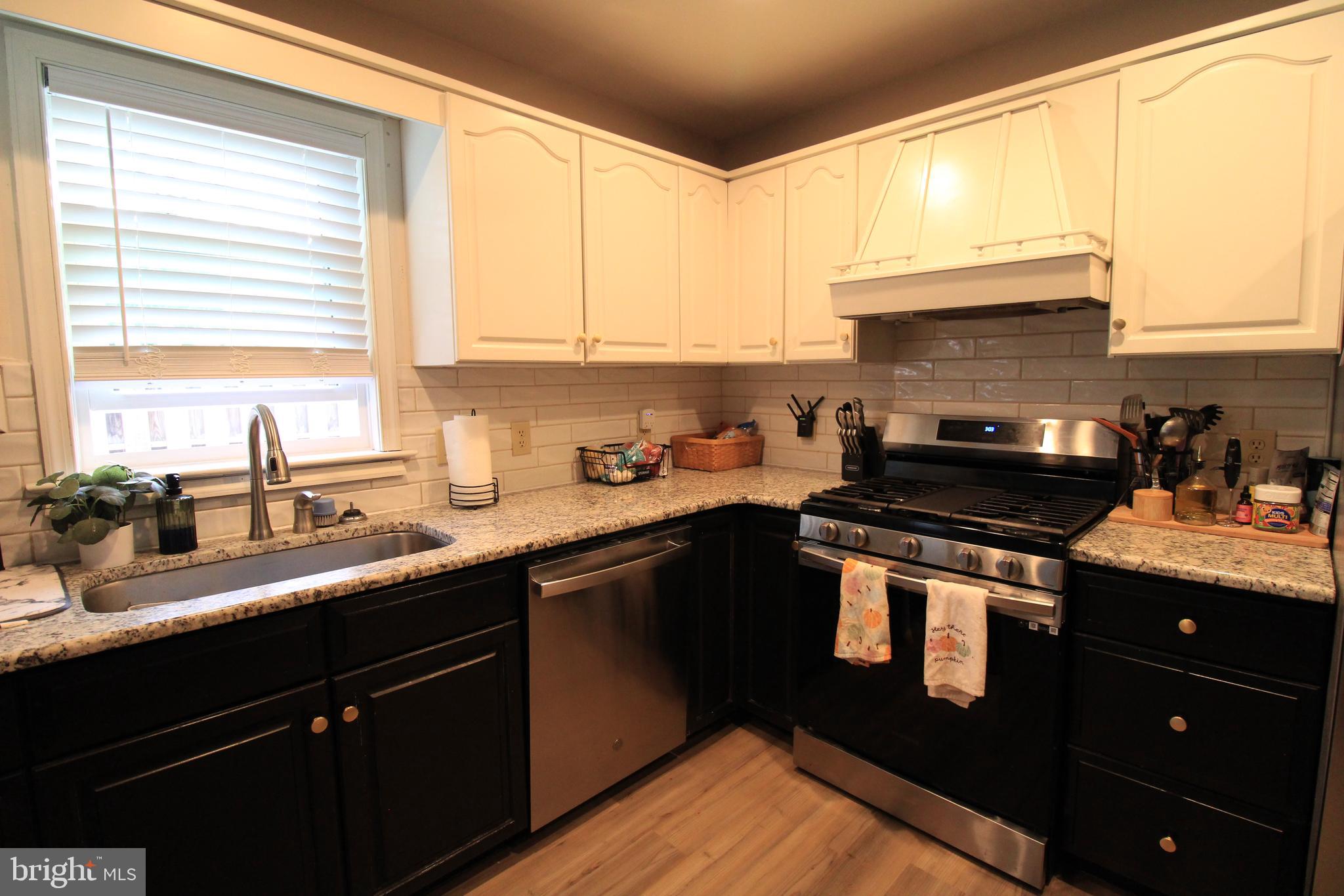2582 Abby Lane Dover, PA 17315 - Photo 16 of 22 a kitchen with granite countertop a sink cabinets and window