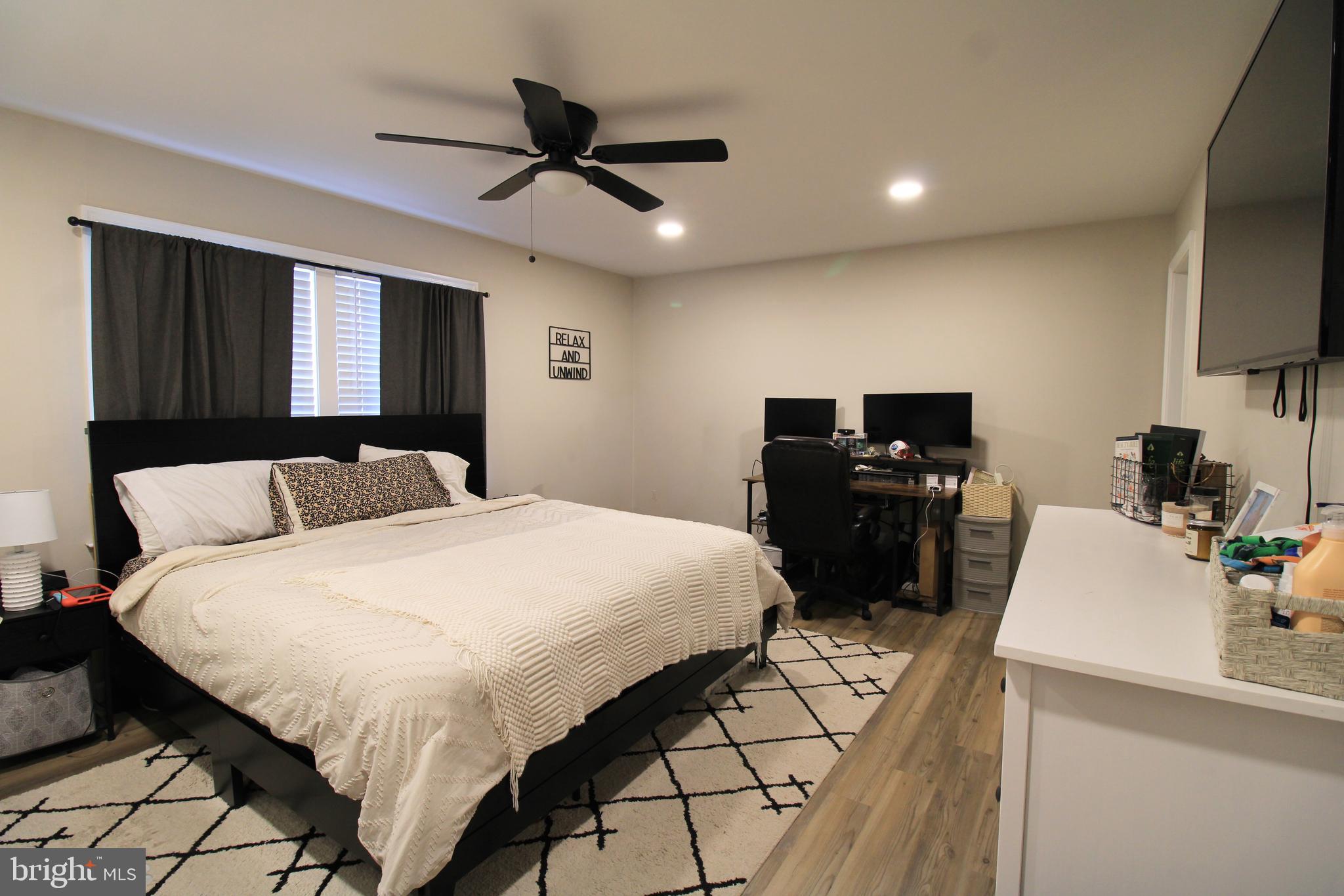 2582 Abby Lane Dover, PA 17315 - Photo 10 of 22 a bedroom with a bed and a flat tv screen on dresser