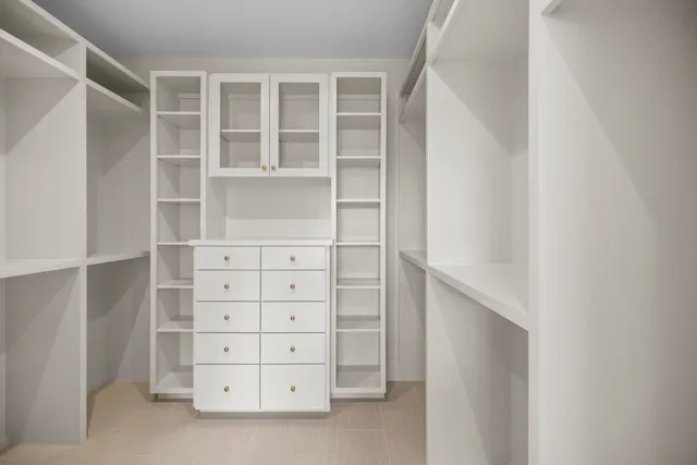a view of an empty walk in closet