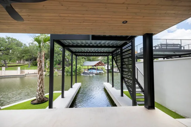 a view of swimming pool with seating space