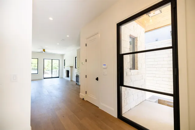 a view of a large window with wooden floor