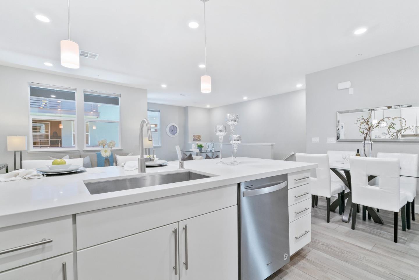 633 Clover Circle Milpitas, CA 95035 - Photo 16 of 36 a kitchen with sink and white cabinets