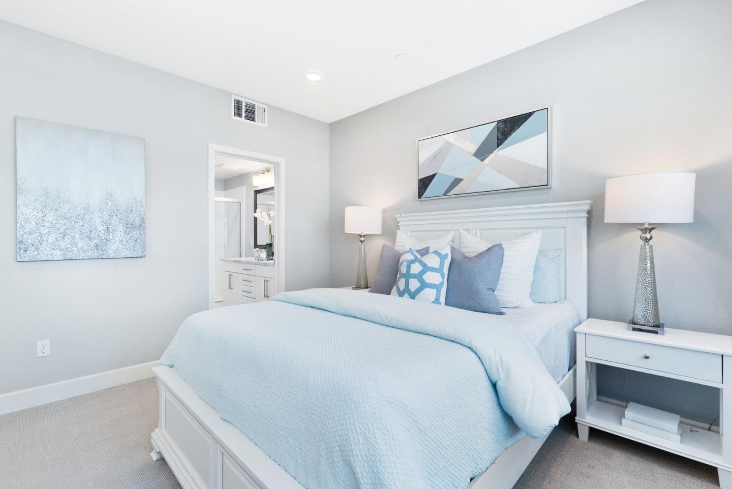 633 Clover Circle Milpitas, CA 95035 - Photo 20 of 36 a bedroom with a bed and a lamp