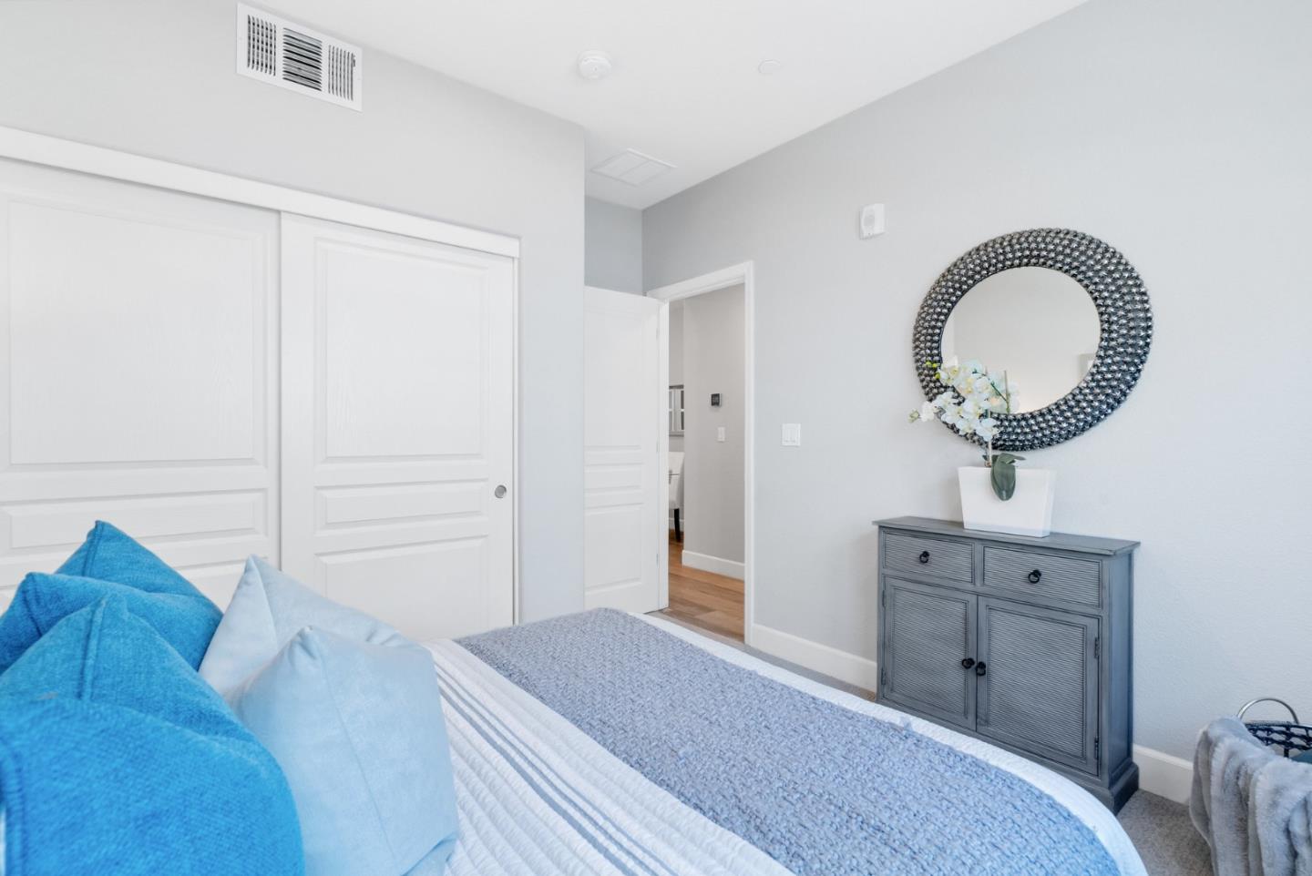 633 Clover Circle Milpitas, CA 95035 - Photo 24 of 36 a bedroom with a bed and a dresser