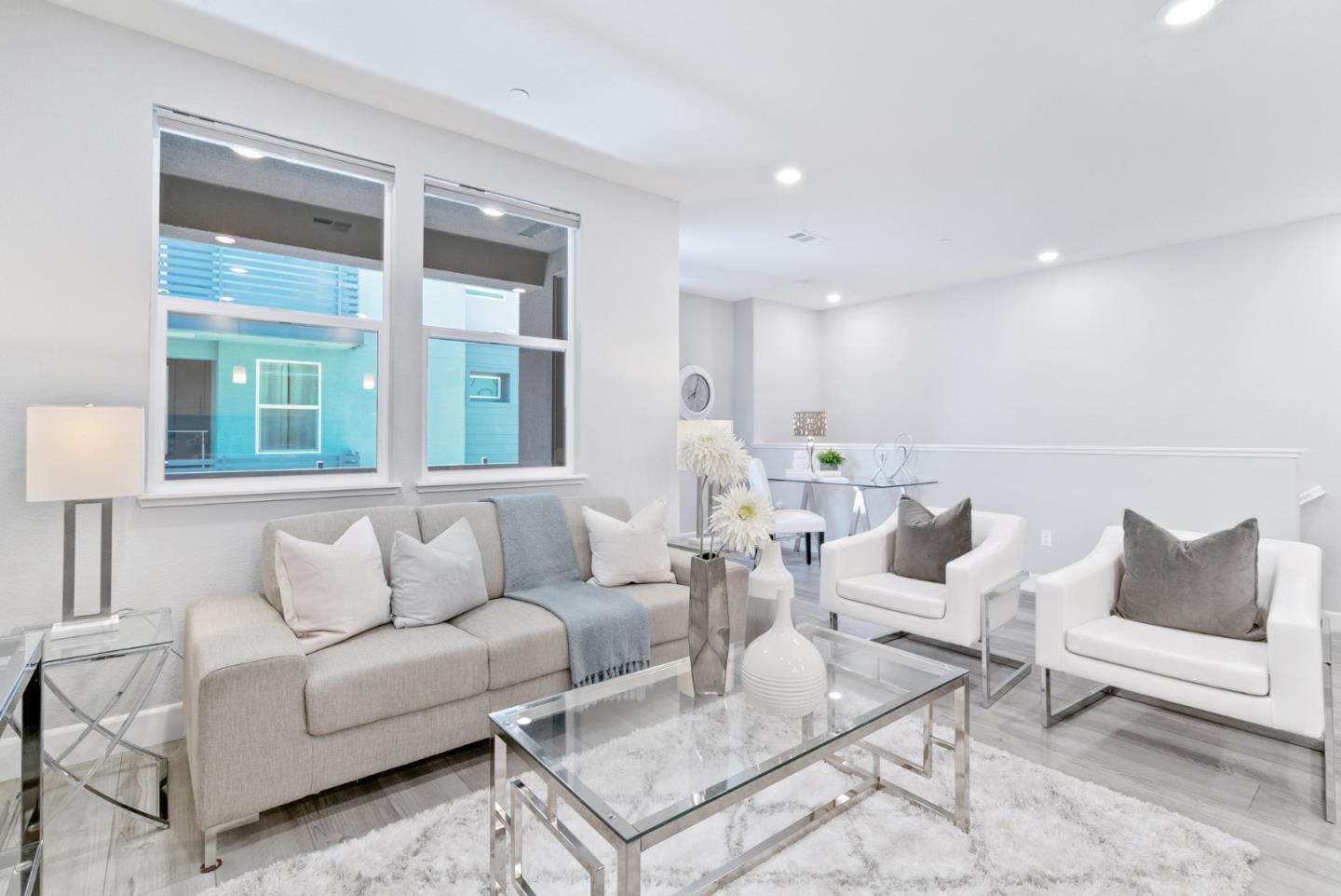 633 Clover Circle Milpitas, CA 95035 - Photo 6 of 36 a living room with furniture and a large window