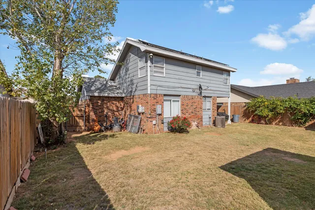 a view of a house with a patio