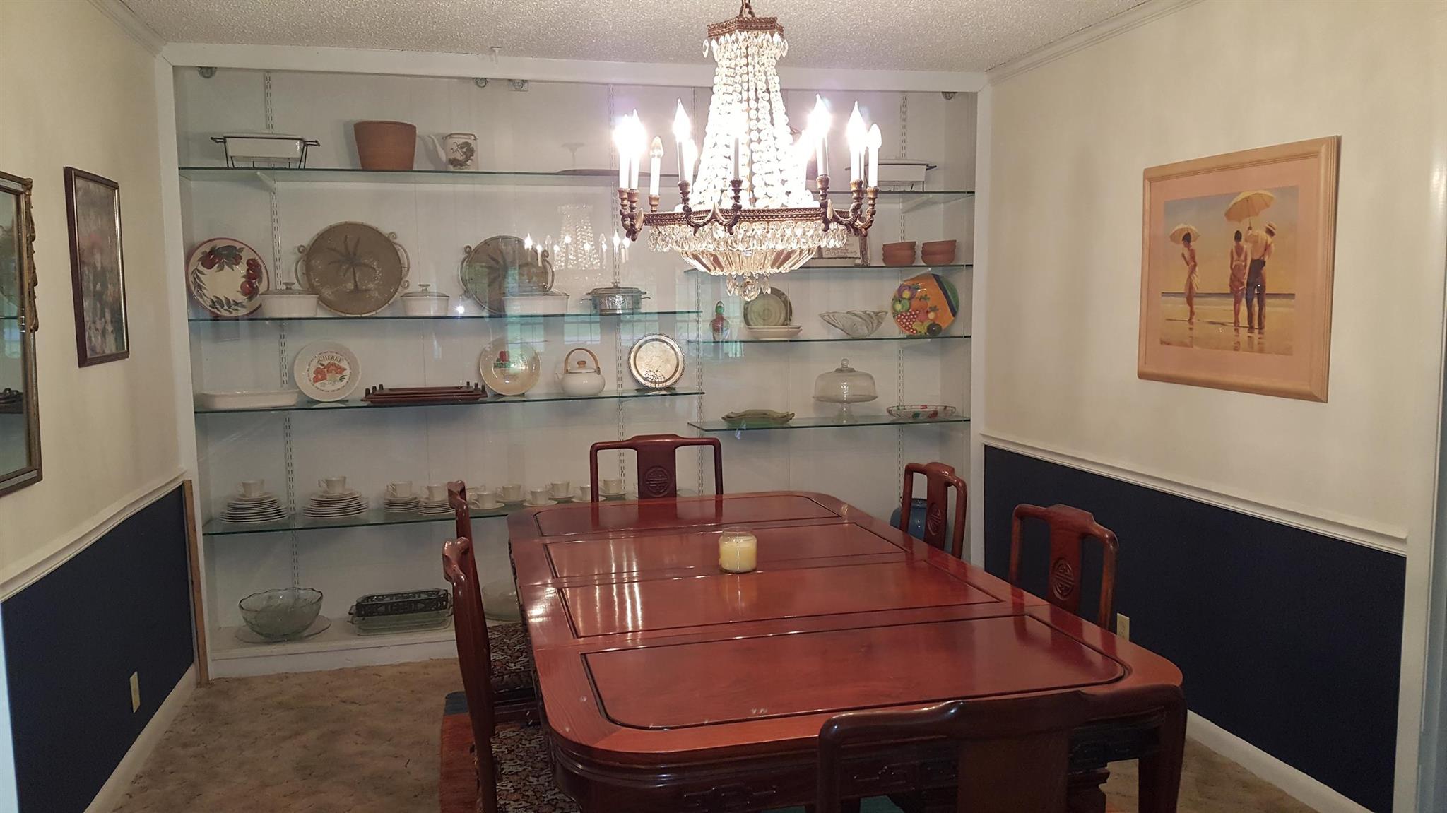5417 Vanderbilt Road Old Hickory, TN 37138 - Photo 7 of 11 a dining room filled with lots of wooden furniture