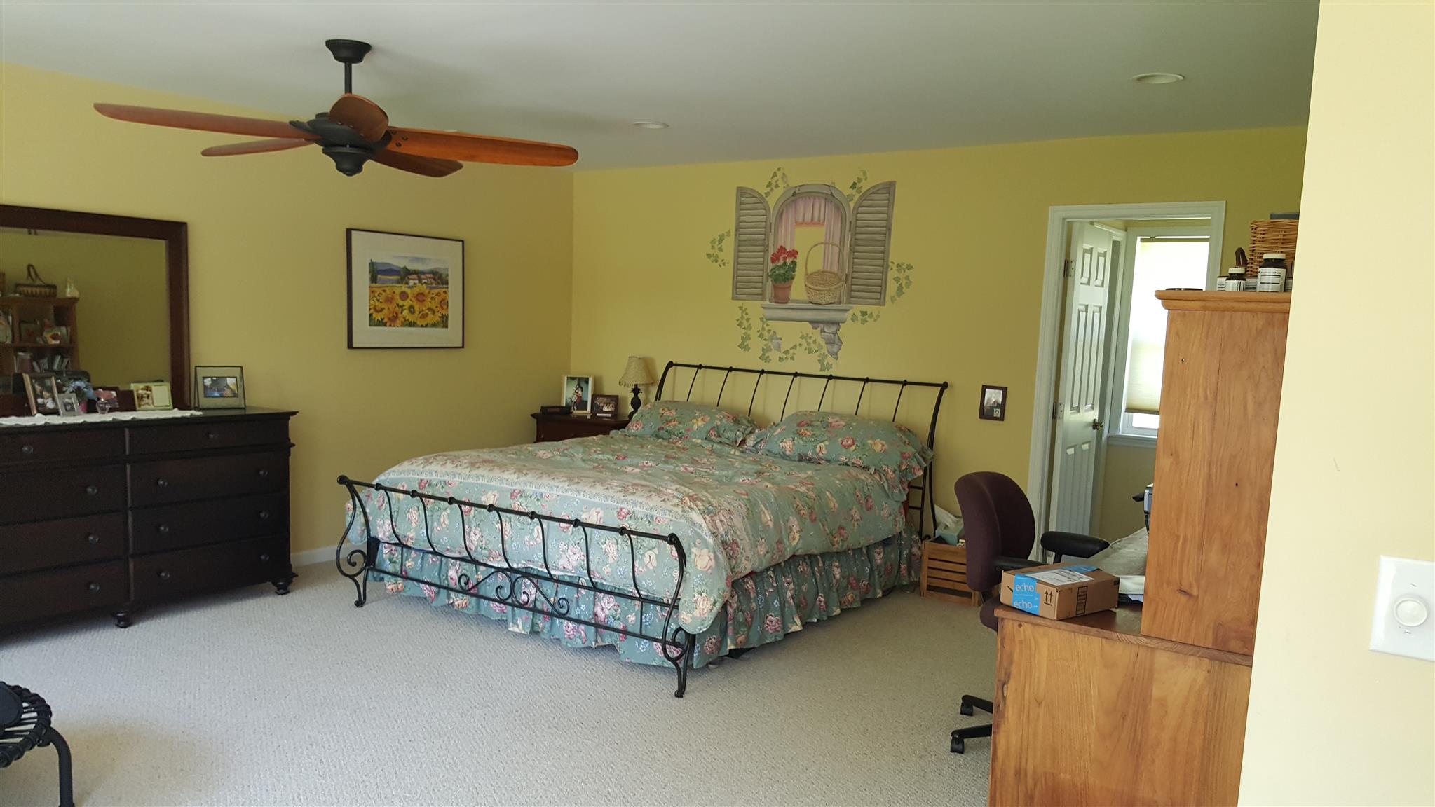5417 Vanderbilt Road Old Hickory, TN 37138 - Photo 9 of 11 a bedroom with a bed and a chandelier