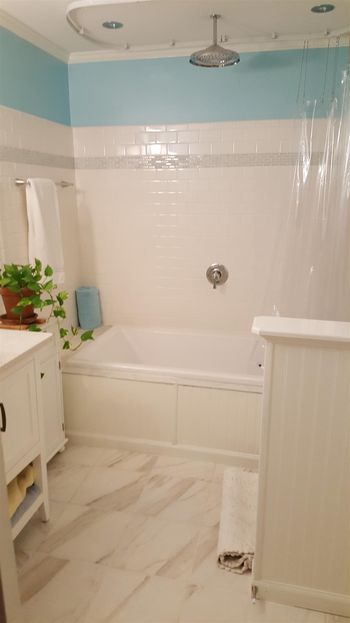 5417 Vanderbilt Road Old Hickory, TN 37138 - Photo 10 of 11 a bathroom with a bathtub and a shower