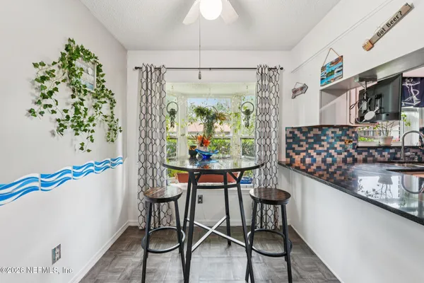 a kitchen with stainless steel appliances granite countertop a stove and a sink