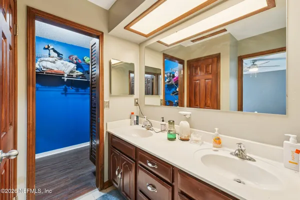 a view of a swimming pool with a yard