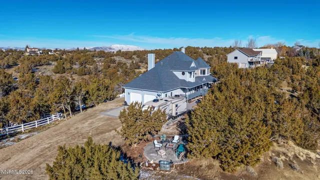 a view of a chairs and table on the terrace