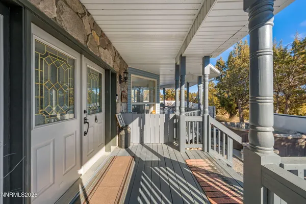 a kitchen with stainless steel appliances granite countertop a refrigerator a stove and a sink with cabinets