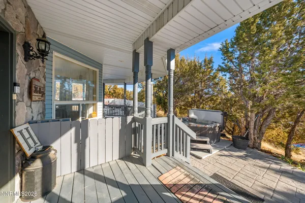 a kitchen with stainless steel appliances granite countertop a refrigerator a stove a sink dishwasher and a refrigerator with wooden cabinets